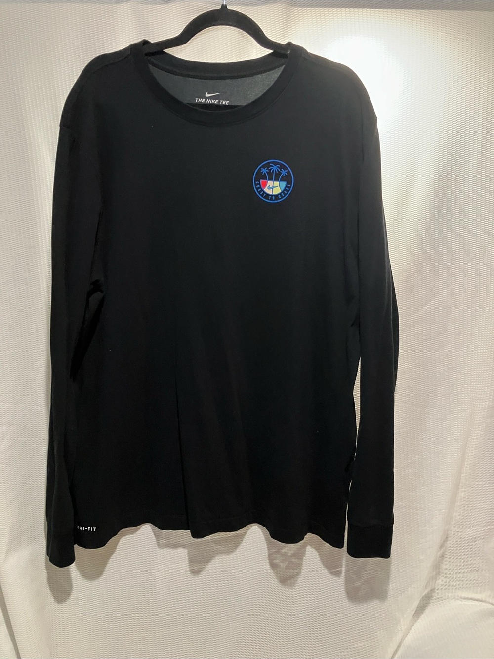 Nike Black Long-Sleeve Tee with Blue Surf Palm Logo
